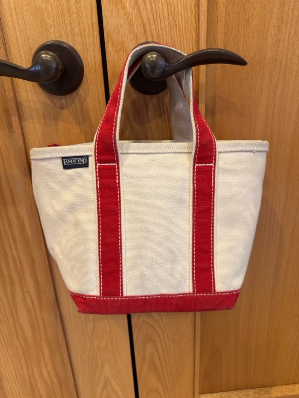 Lands’End canvas tote with zipper closure. Vintage love original tag!